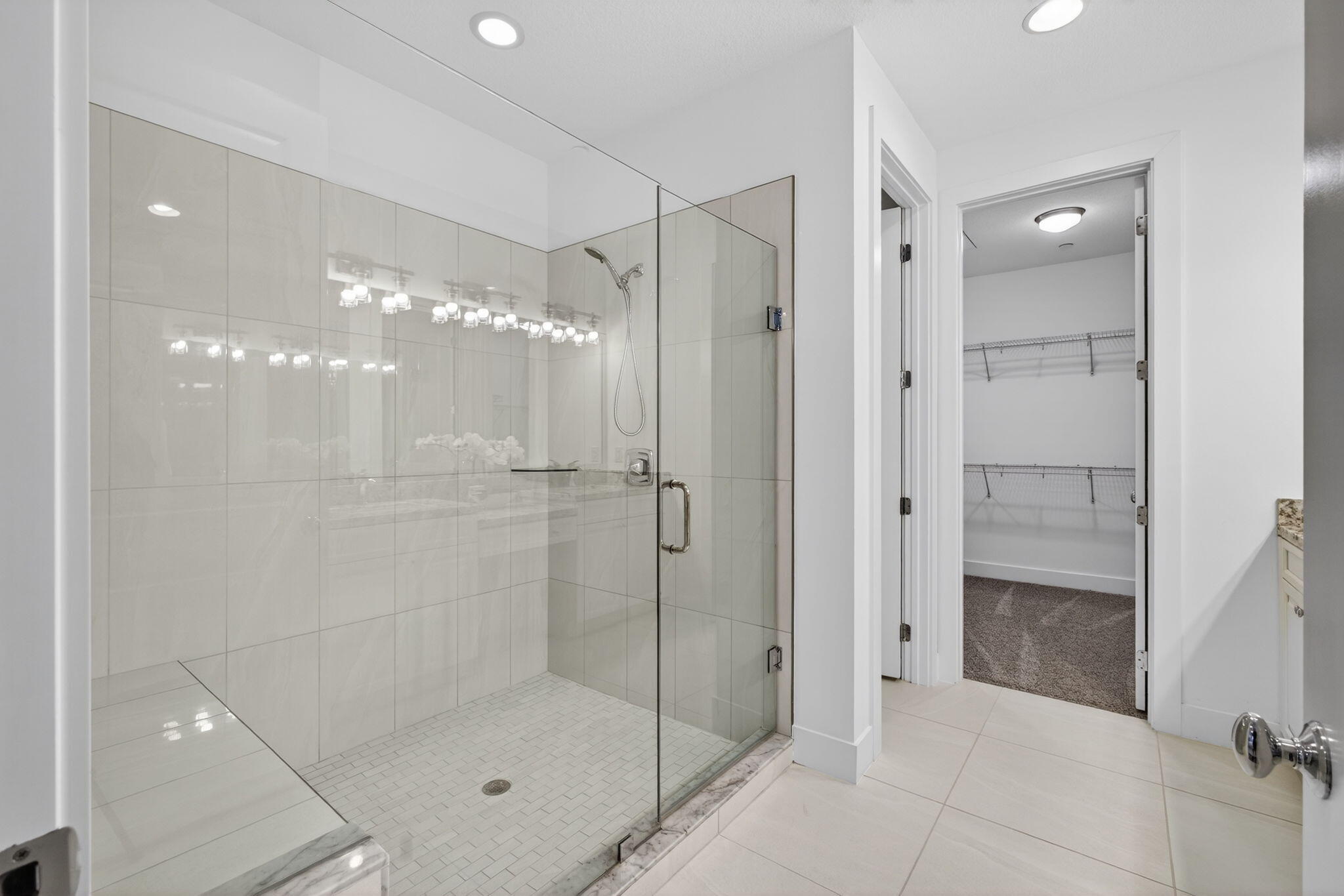 13392 Alton Road Palm Beach Gardens, FL 33418 - Photo 34 of 57 a bathroom with a shower