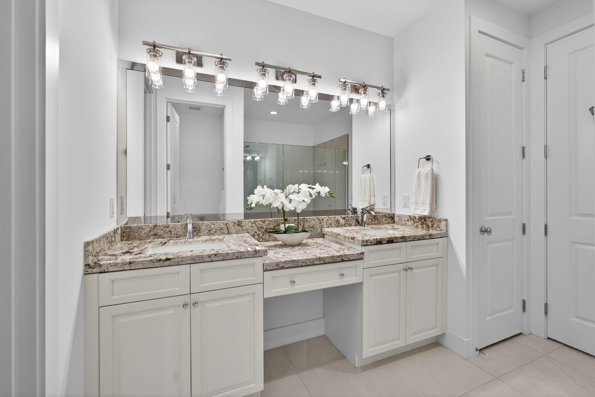 13392 Alton Road Palm Beach Gardens, FL 33418 - Photo 35 of 57 a bathroom with a sink and a mirror