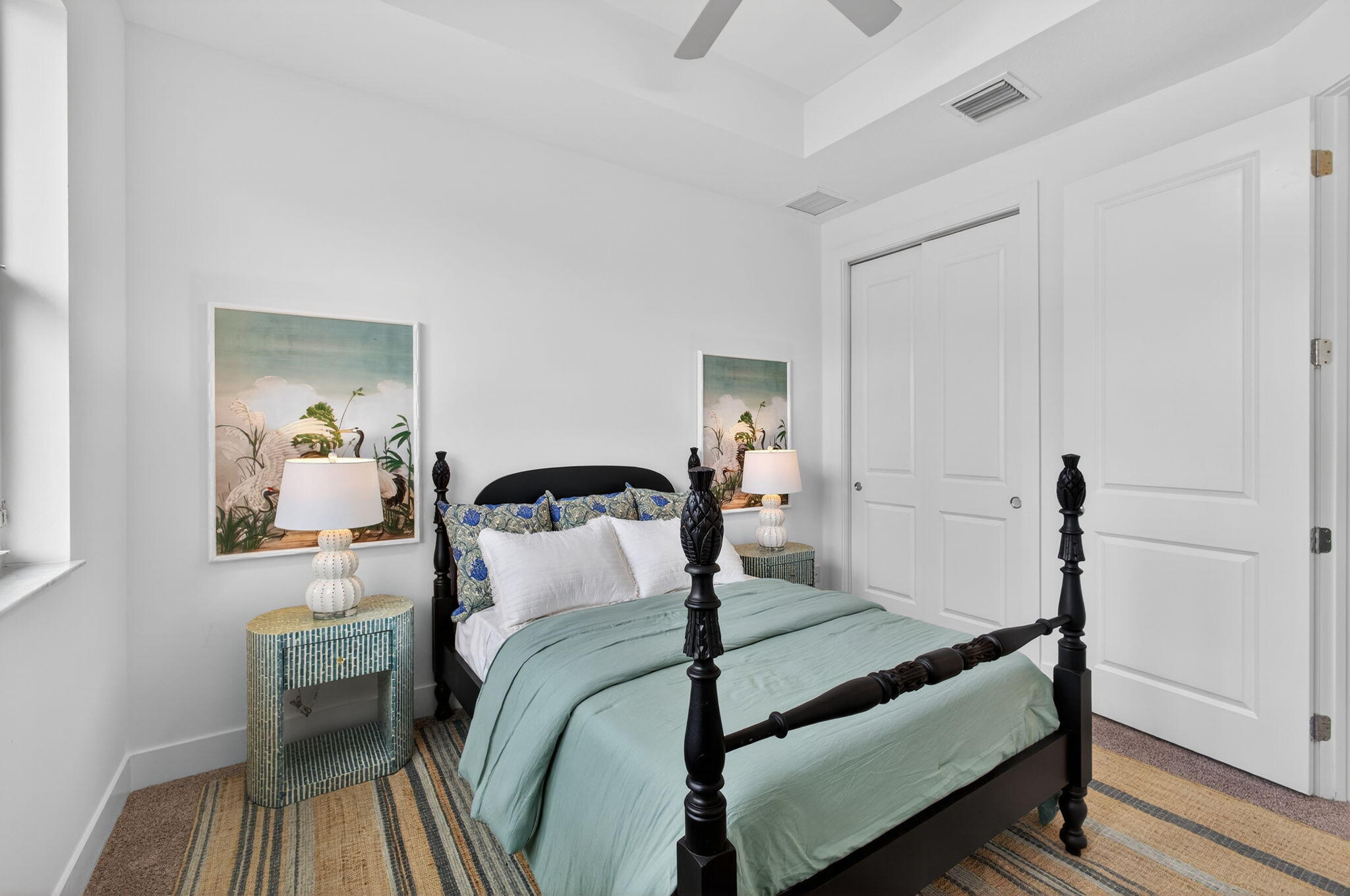 13392 Alton Road Palm Beach Gardens, FL 33418 - Photo 41 of 57 a bedroom with a bed and wooden floor