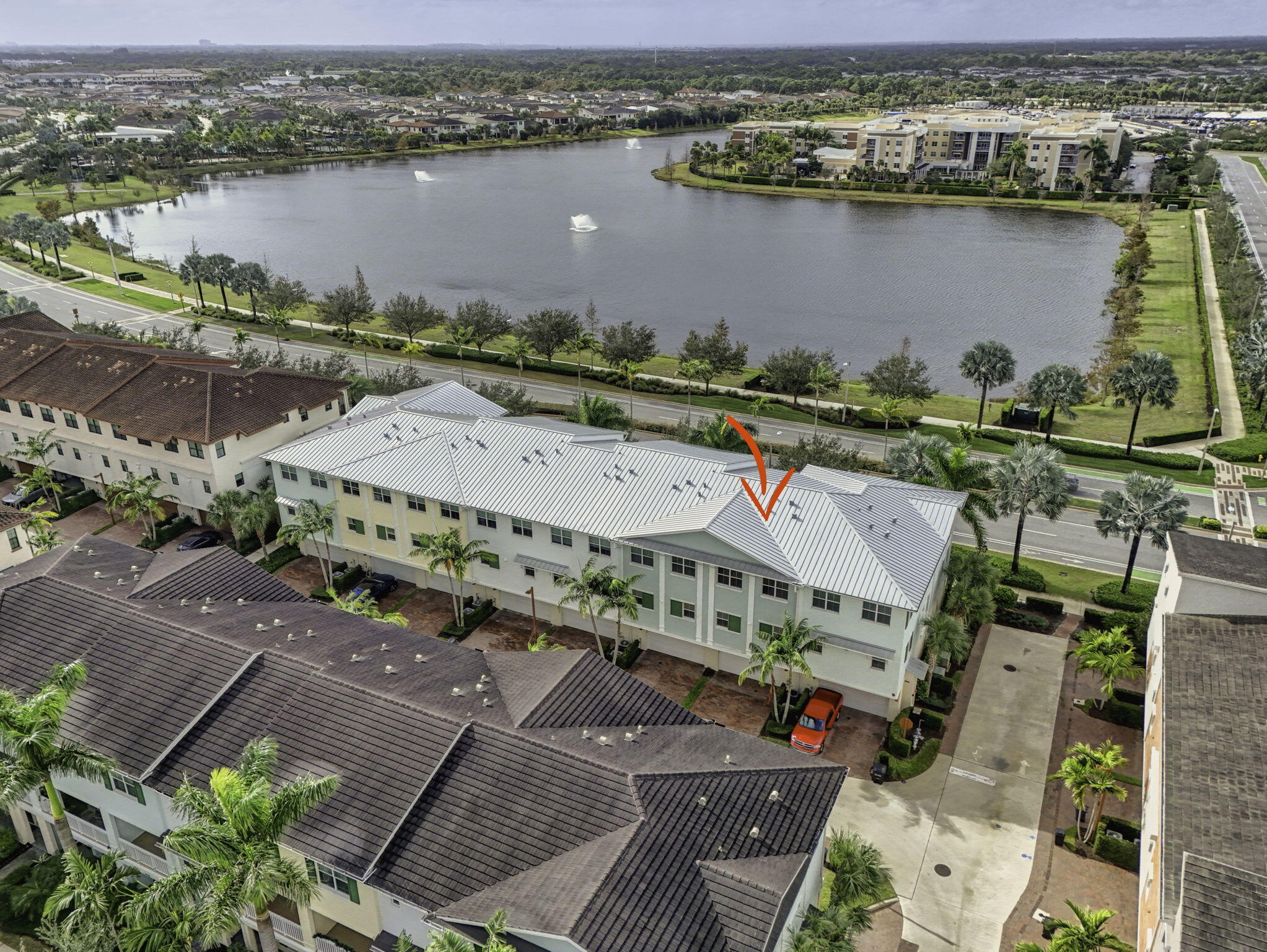 13392 Alton Road Palm Beach Gardens, FL 33418 - Photo 51 of 57 an aerial view of a city with lake view