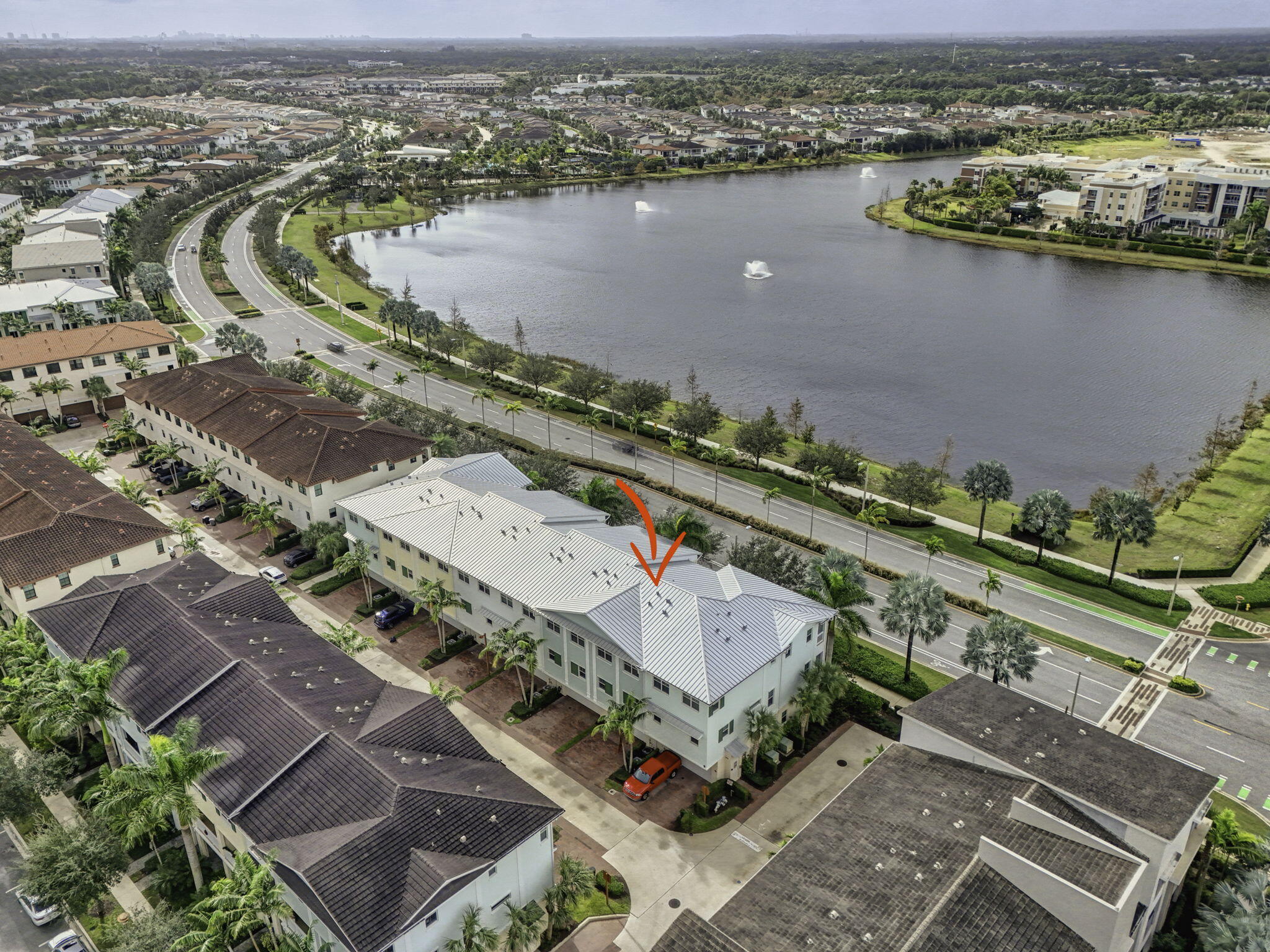 13392 Alton Road Palm Beach Gardens, FL 33418 - Photo 52 of 57 an aerial view of a city with houses