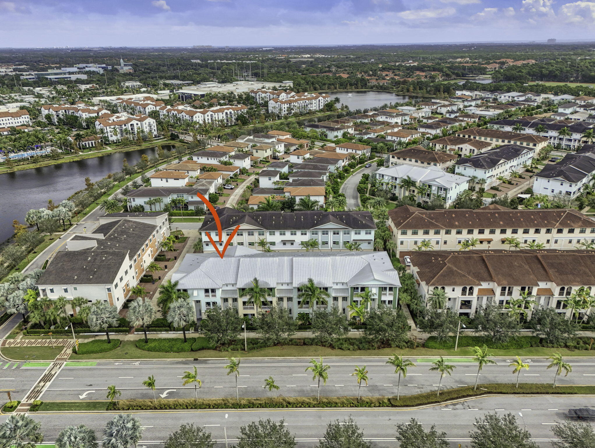 13392 Alton Road Palm Beach Gardens, FL 33418 - Photo 54 of 57 an aerial view of a house with a yard and lake view