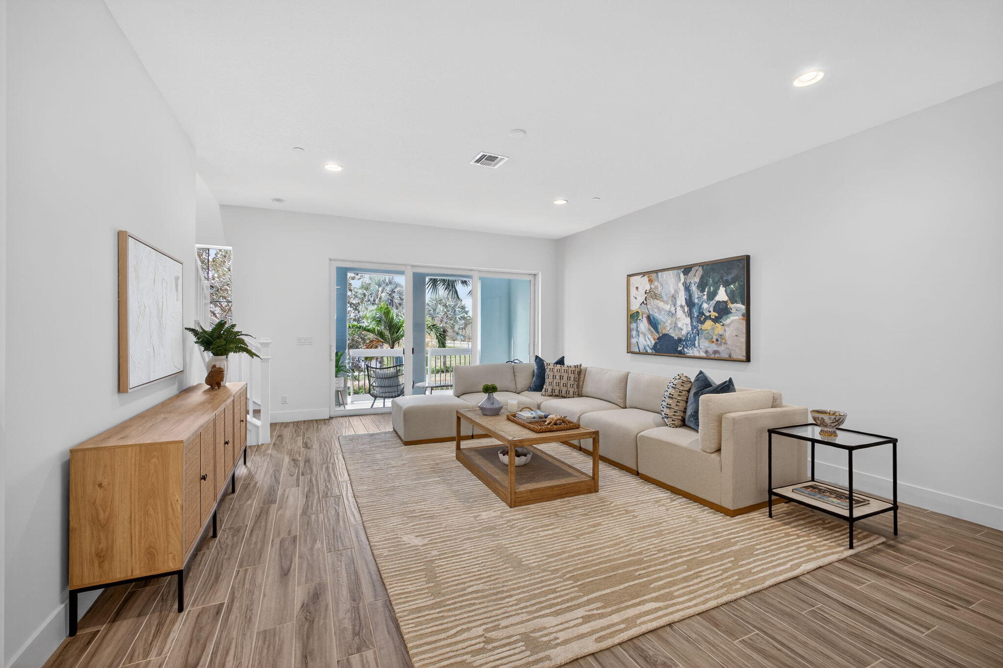 13392 Alton Road Palm Beach Gardens, FL 33418 - Photo 6 of 57 a living room with furniture and a window