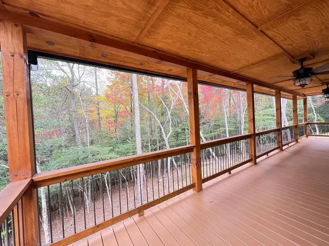 a view of balcony with a couple of wooden floor