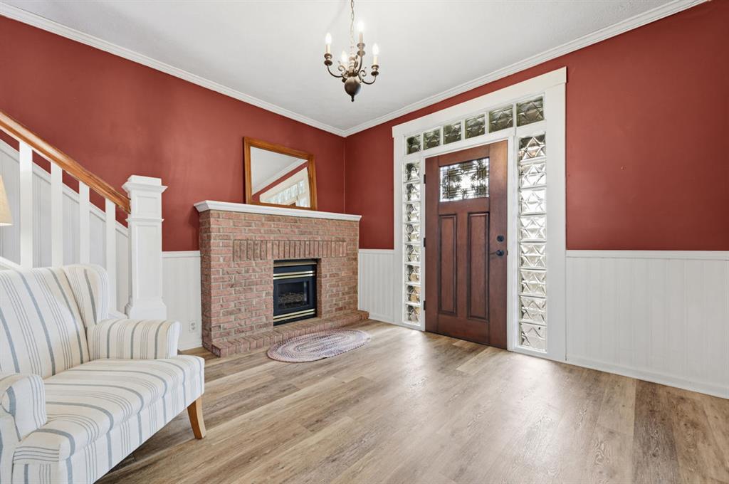 144 Davis Avenue McKees Rocks, PA 15136 - Photo 11 of 50 a living room with furniture and a fireplace