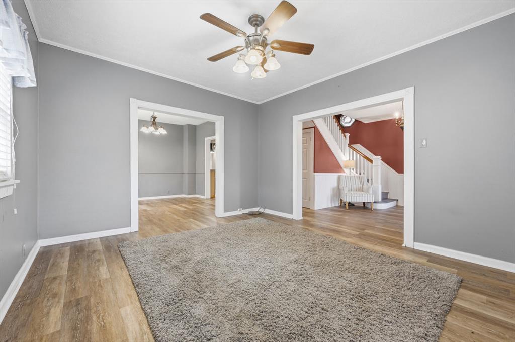 144 Davis Avenue McKees Rocks, PA 15136 - Photo 15 of 50 wooden floor with a chandelier and a window