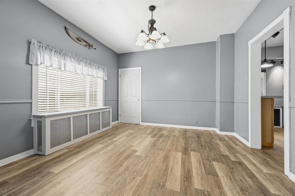 144 Davis Avenue McKees Rocks, PA 15136 - Photo 21 of 50 a view of empty room with wooden floor and fan