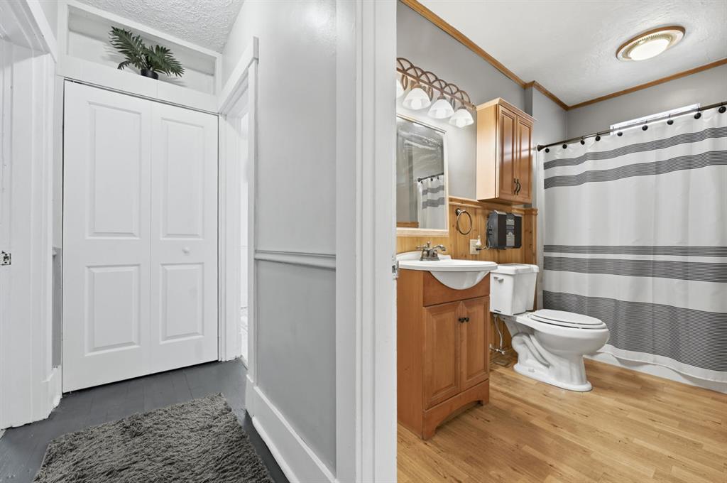 144 Davis Avenue McKees Rocks, PA 15136 - Photo 45 of 50 a bathroom with a toilet a sink and a shower