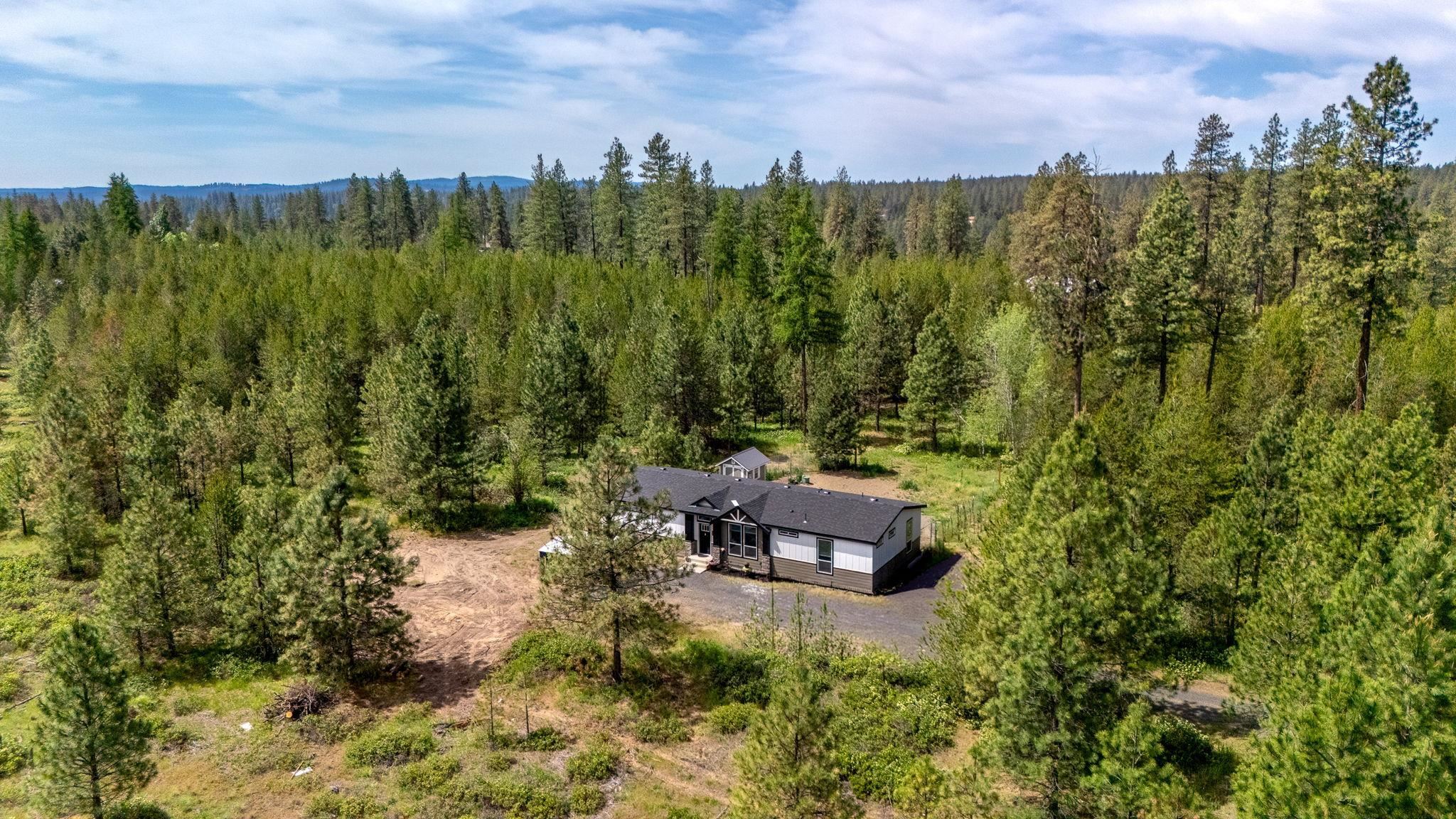 28995 North Hardesty Road Chattaroy, WA 99003 - Photo 1 of 46