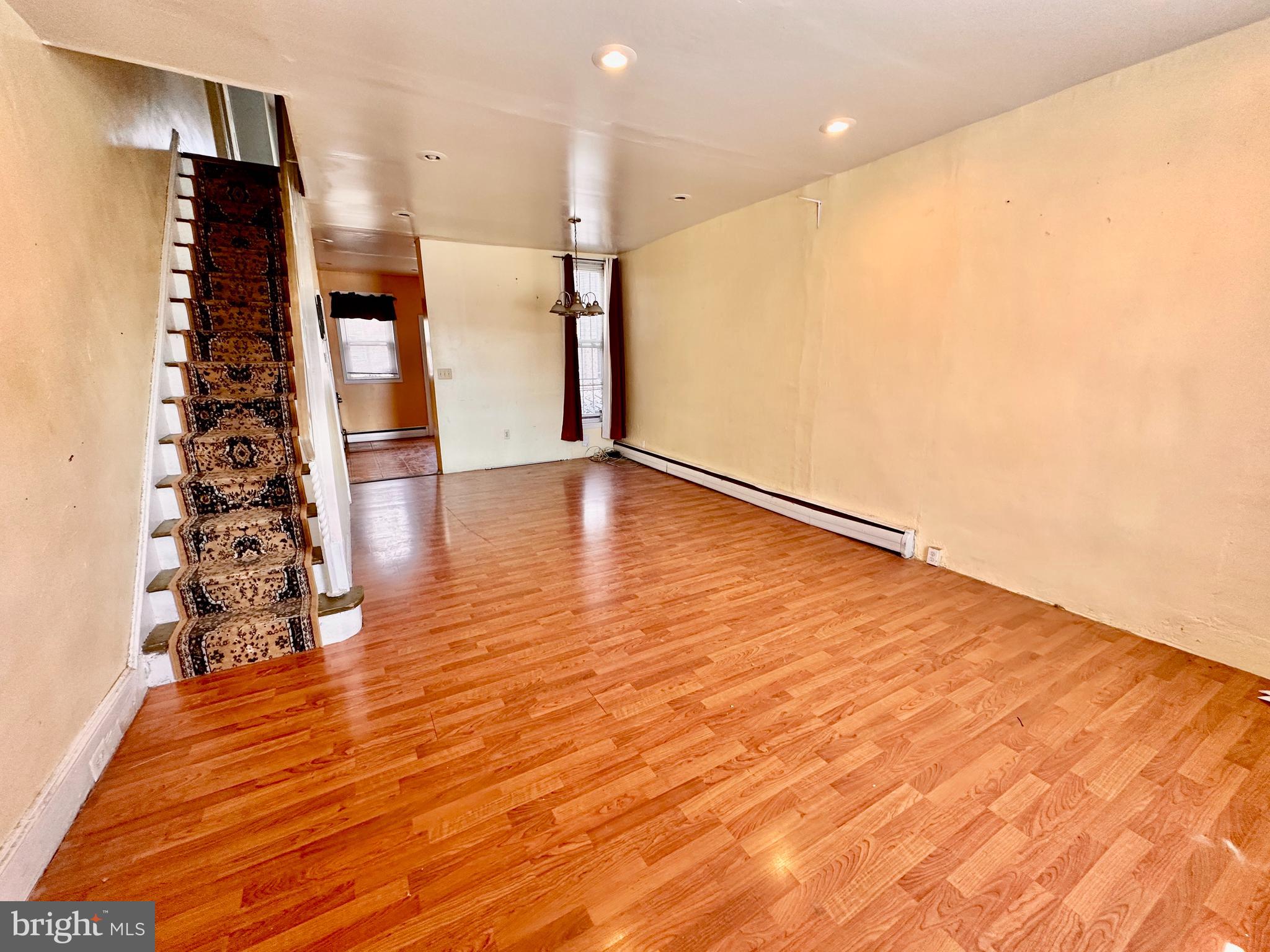 3223 North Bambrey Street Philadelphia, PA 19129 - Photo 2 of 14 wooden floor in an empty room with wooden floor