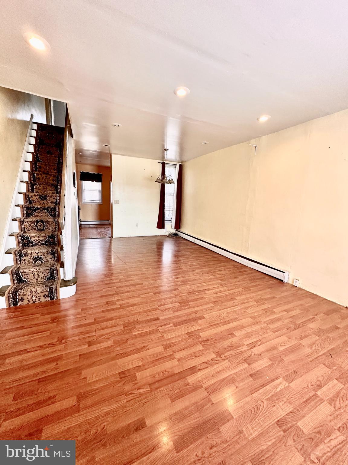 3223 North Bambrey Street Philadelphia, PA 19129 - Photo 3 of 14 a view of an empty room with wooden floor