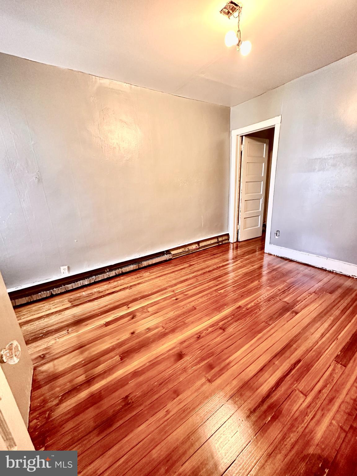3223 North Bambrey Street Philadelphia, PA 19129 - Photo 10 of 14 a view of room with wooden floor and fan