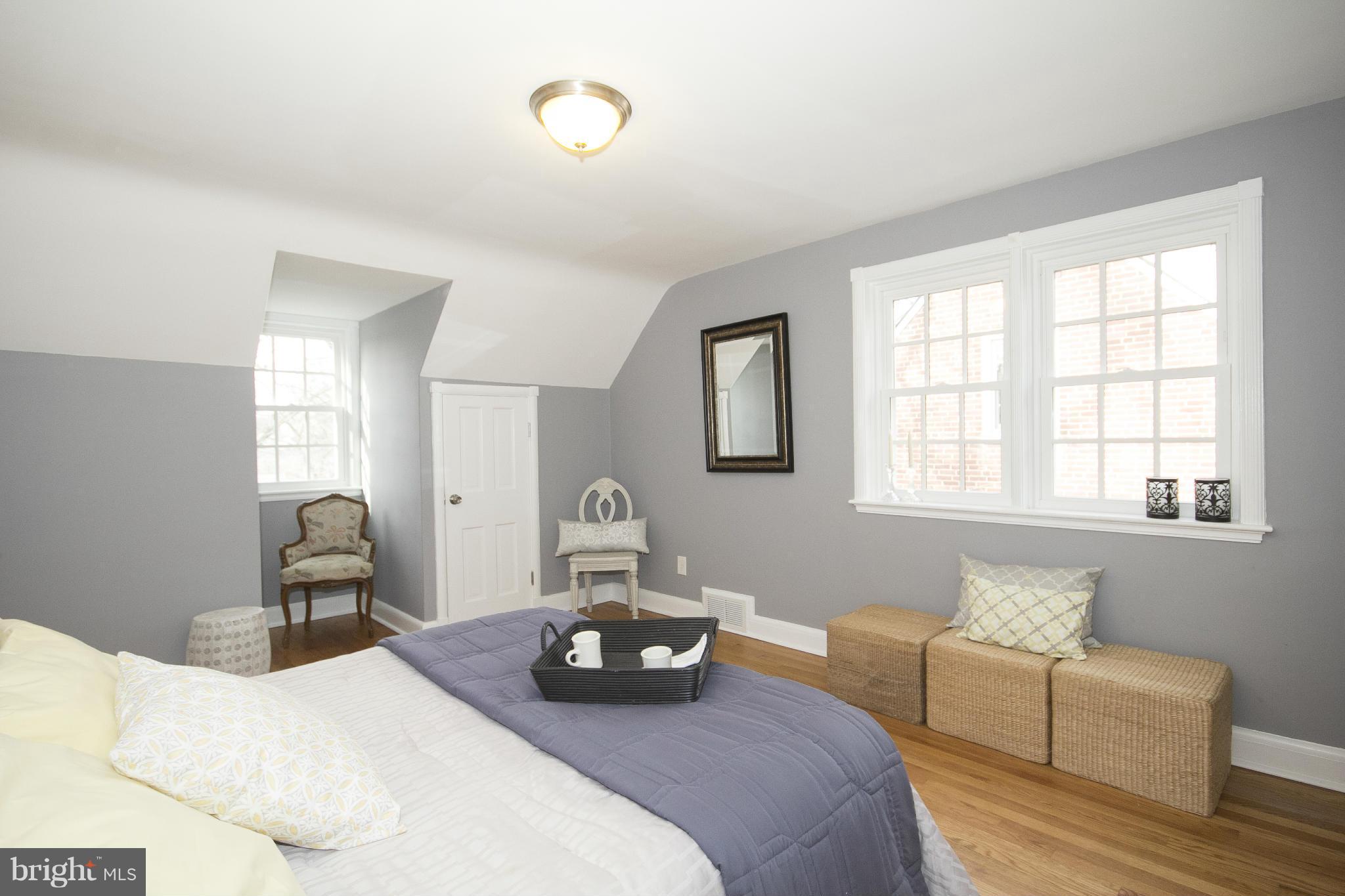 4033 Deepwood Road Baltimore, MD 21218 - Photo 14 of 30 a bedroom with furniture and a window