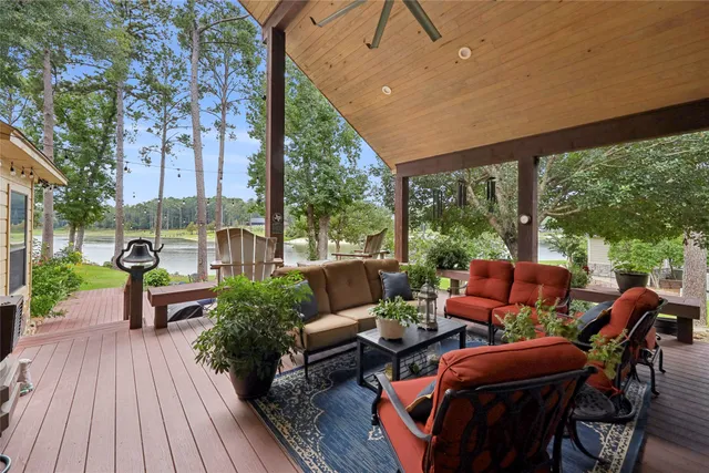 a backyard of a house with outdoor seating
