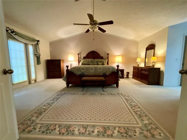 a living room with furniture rug and window