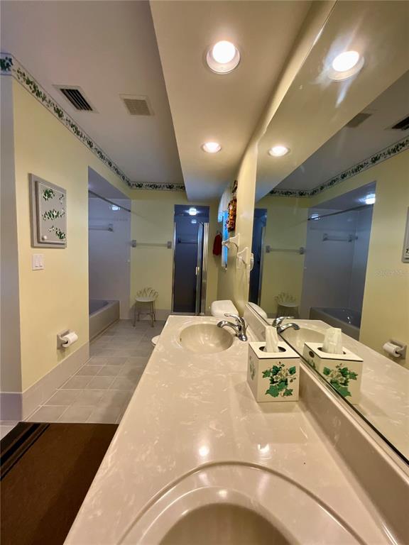 7205 Northeast 61st Ave Road Silver Springs, FL 34488 - Photo 31 of 64 a bed room with a bed