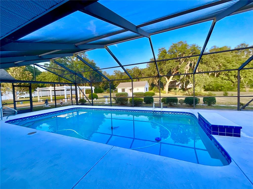 7205 Northeast 61st Ave Road Silver Springs, FL 34488 - Photo 47 of 64 a view of a gym with an outdoor space