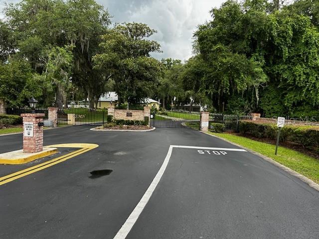 7205 Northeast 61st Ave Road Silver Springs, FL 34488 - Photo 53 of 64 a view of a swimming pool with a patio