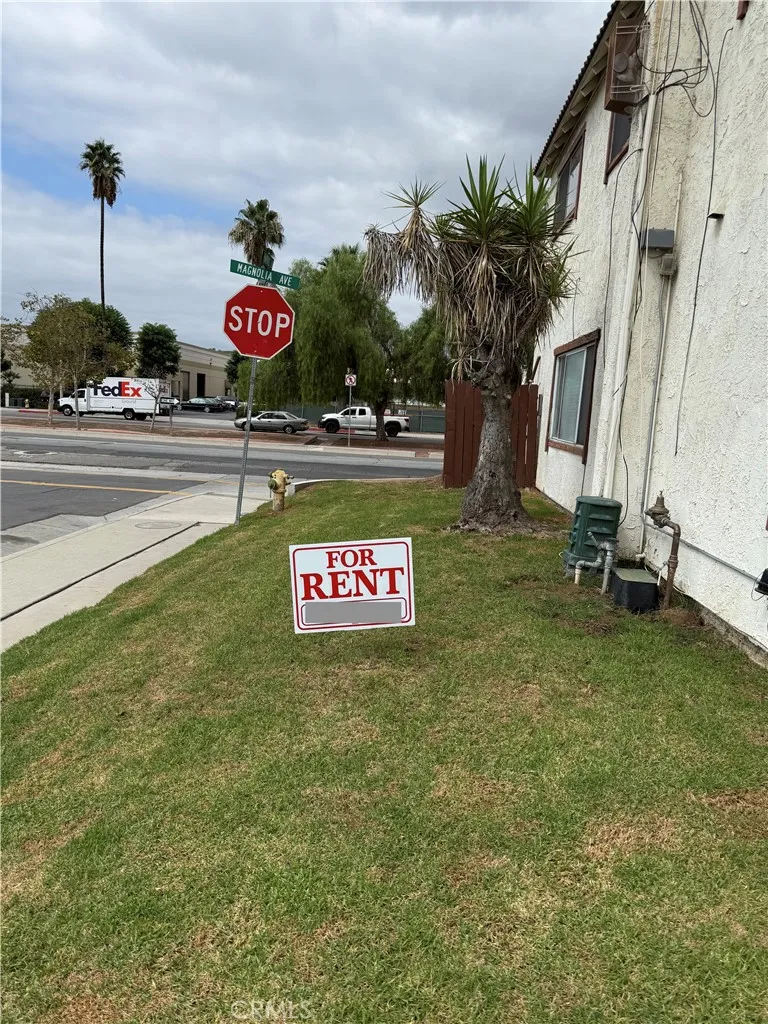 3791 Harvill Lane, Unit 4 Riverside, CA 92503 - Photo 9 of 10 a sign board with yellow lighting on the wall