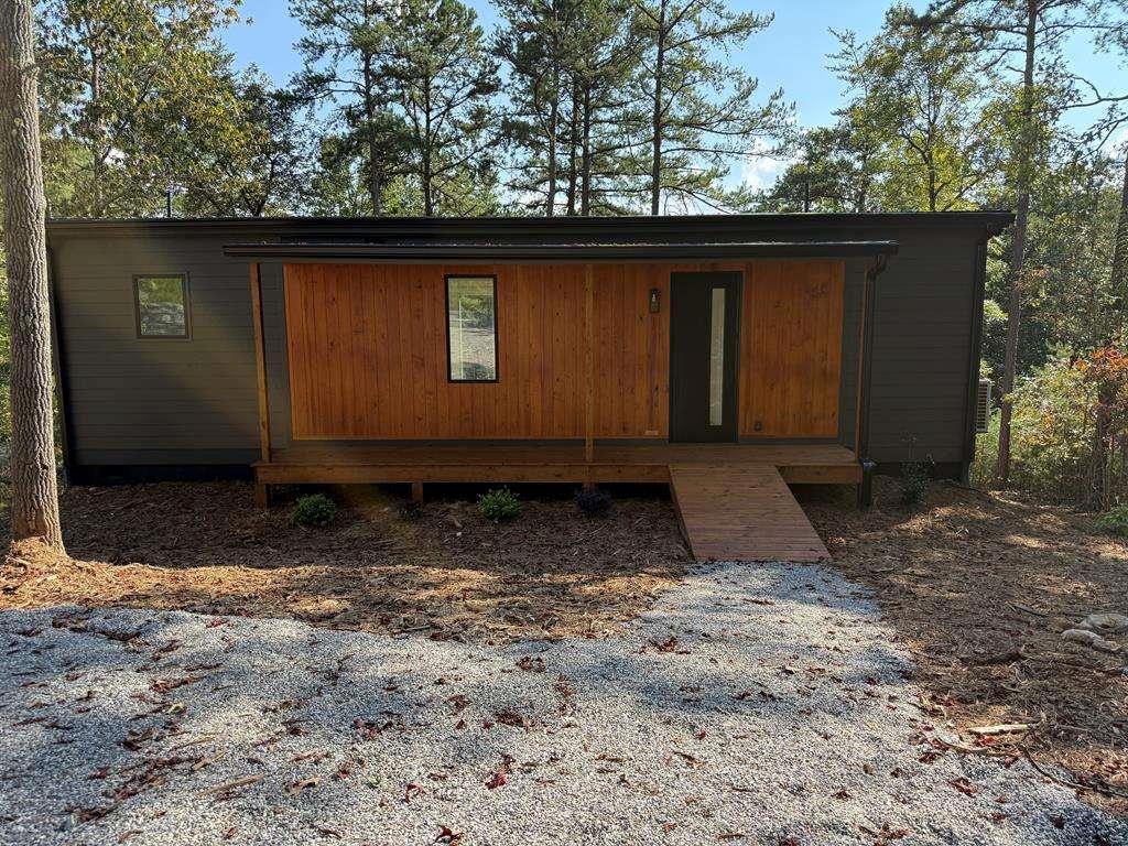 a view of backyard with green space