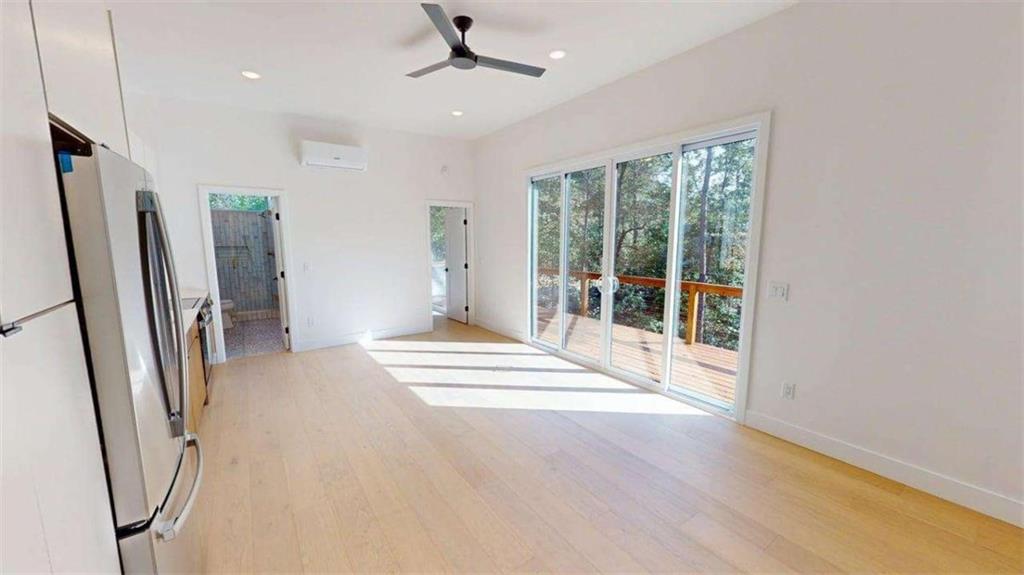 525 Brannon Ridge Young Harris, GA 30582 - Photo 5 of 12 a view of empty room with wooden floor and fan