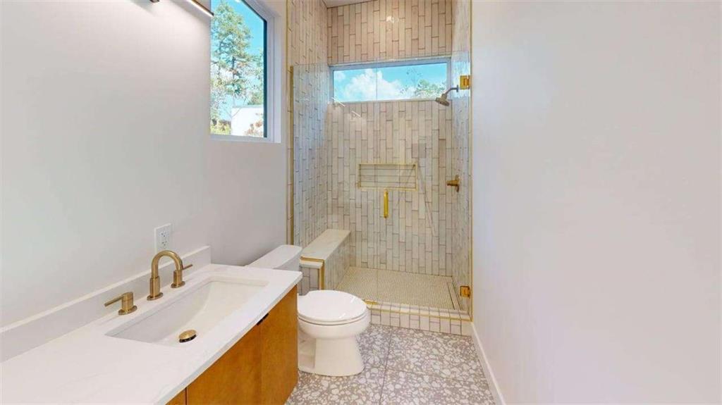 525 Brannon Ridge Young Harris, GA 30582 - Photo 7 of 12 a bathroom with a sink and a mirror