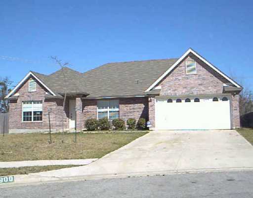 900 Swallow Ridge Cove Pflugerville, TX 78660 - Photo 1 of 1 a front view of a house with a yard and garage