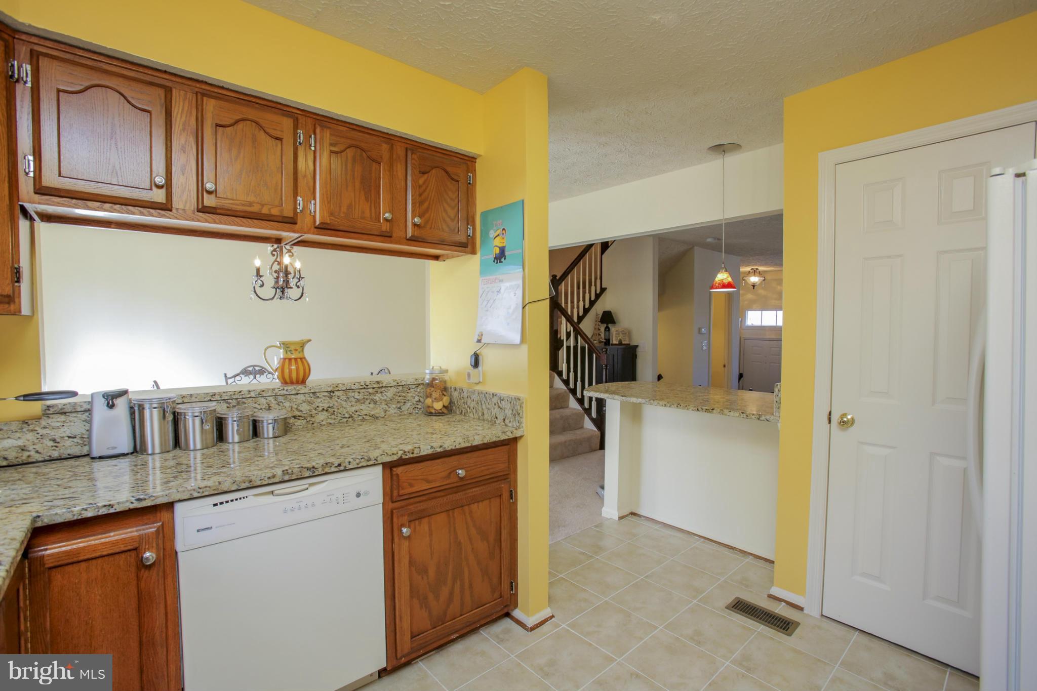 14073 Winding Ridge Lane Centreville, VA 20121 - Photo 13 of 29 Kitchen - new stove, ceramic tiles, Granite