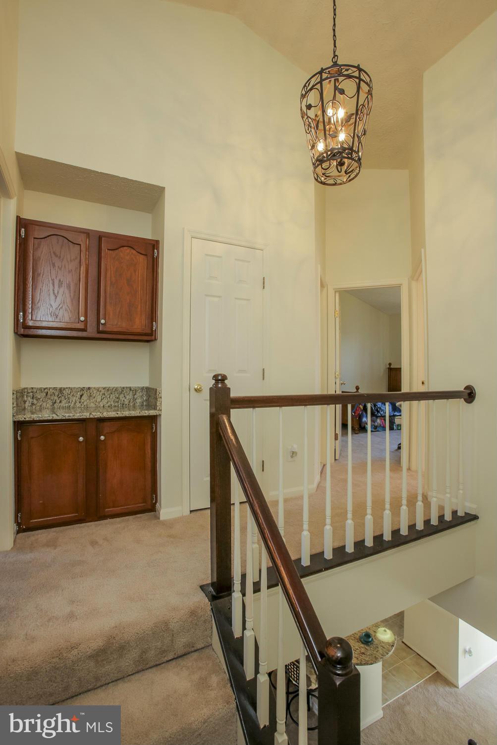 14073 Winding Ridge Lane Centreville, VA 20121 - Photo 27 of 29 Upper Hall - Cabinets for storage