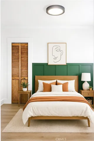 a bathroom with a toilet sink and a mirror