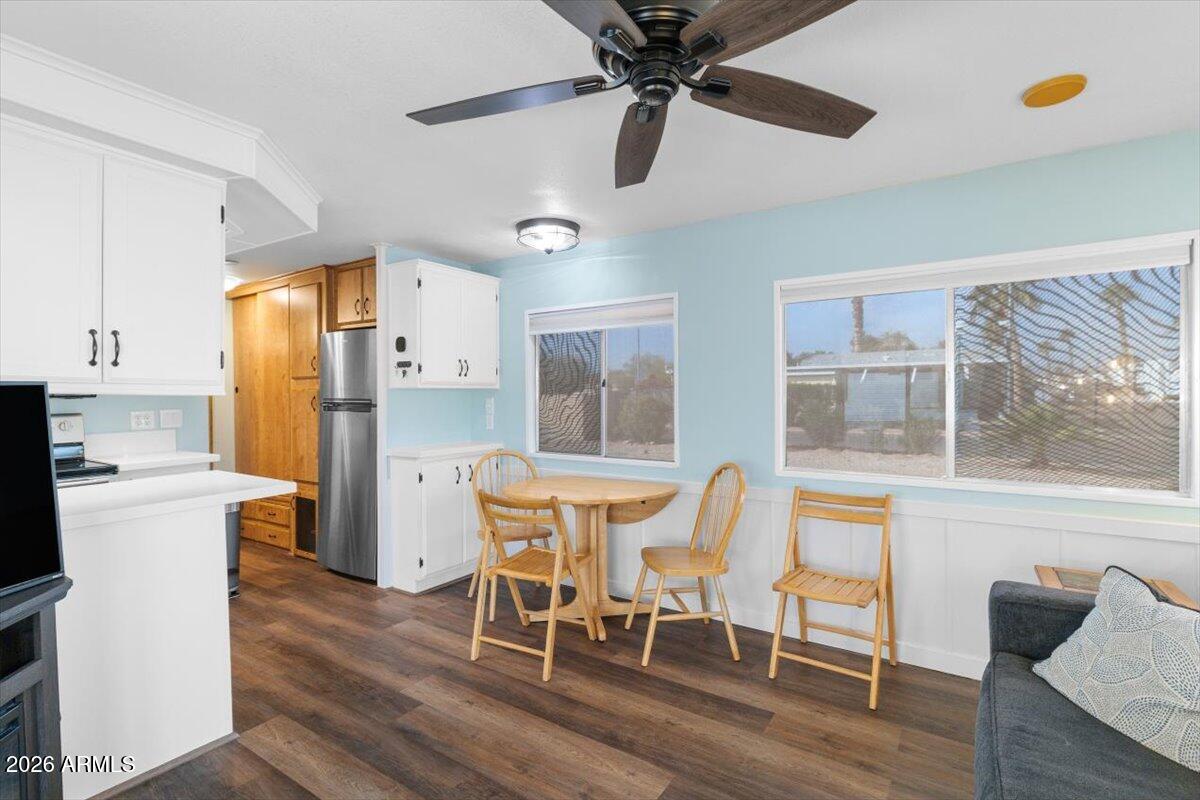 11201 North El Mirage Road, Unit 725 El Mirage, AZ 85335 - Photo 5 of 15 a dining room with furniture and window