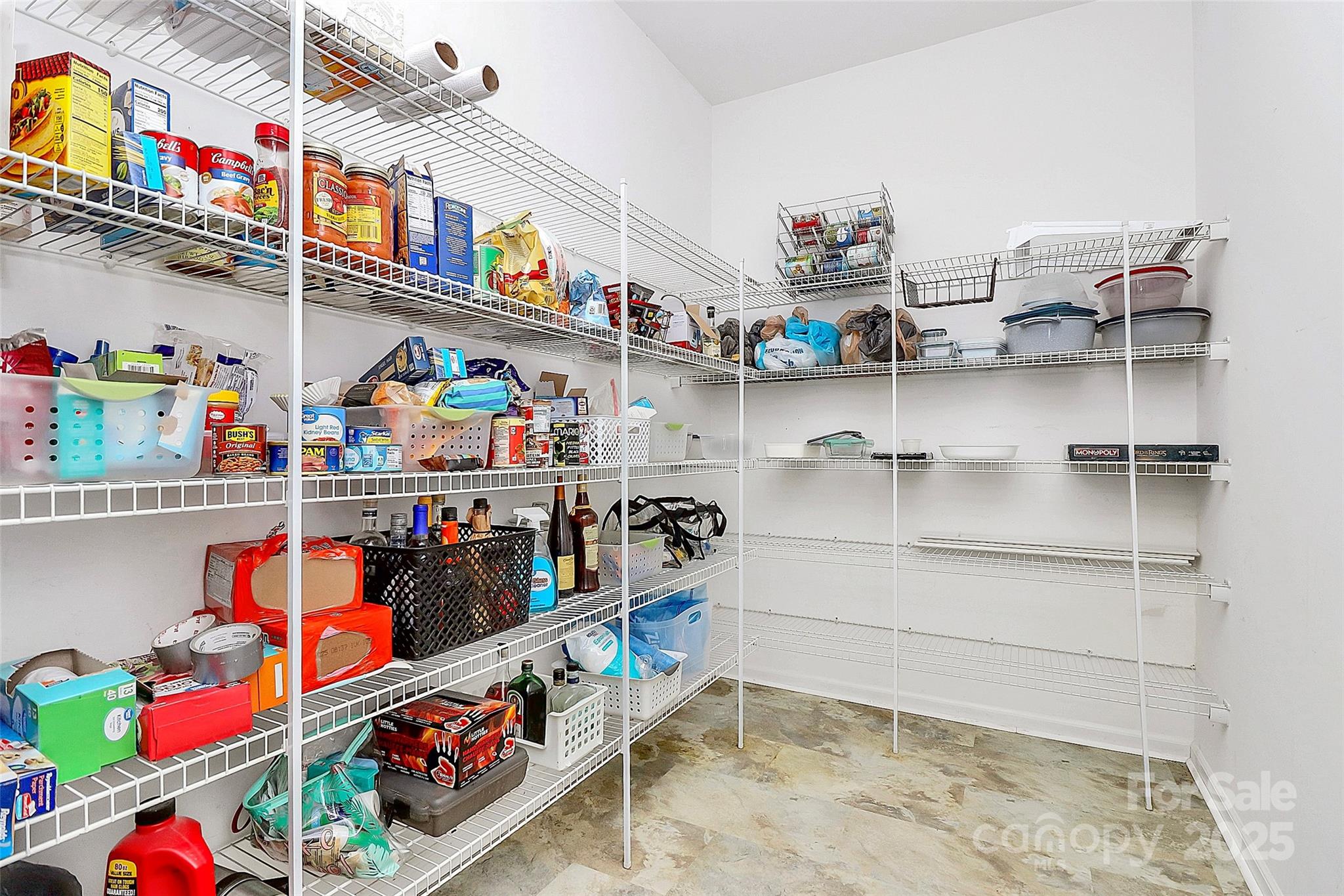 1817 Tradd Avenue Clover, SC 29710 - Photo 27 of 42 a store room with lots of clutter and lots of shelves