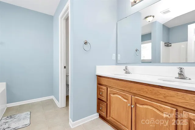 a white bath tub sitting next to a window