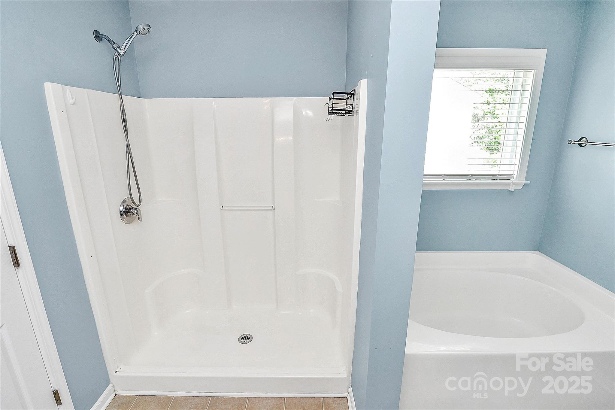 1817 Tradd Avenue Clover, SC 29710 - Photo 35 of 42 a white bath tub sitting next to a window
