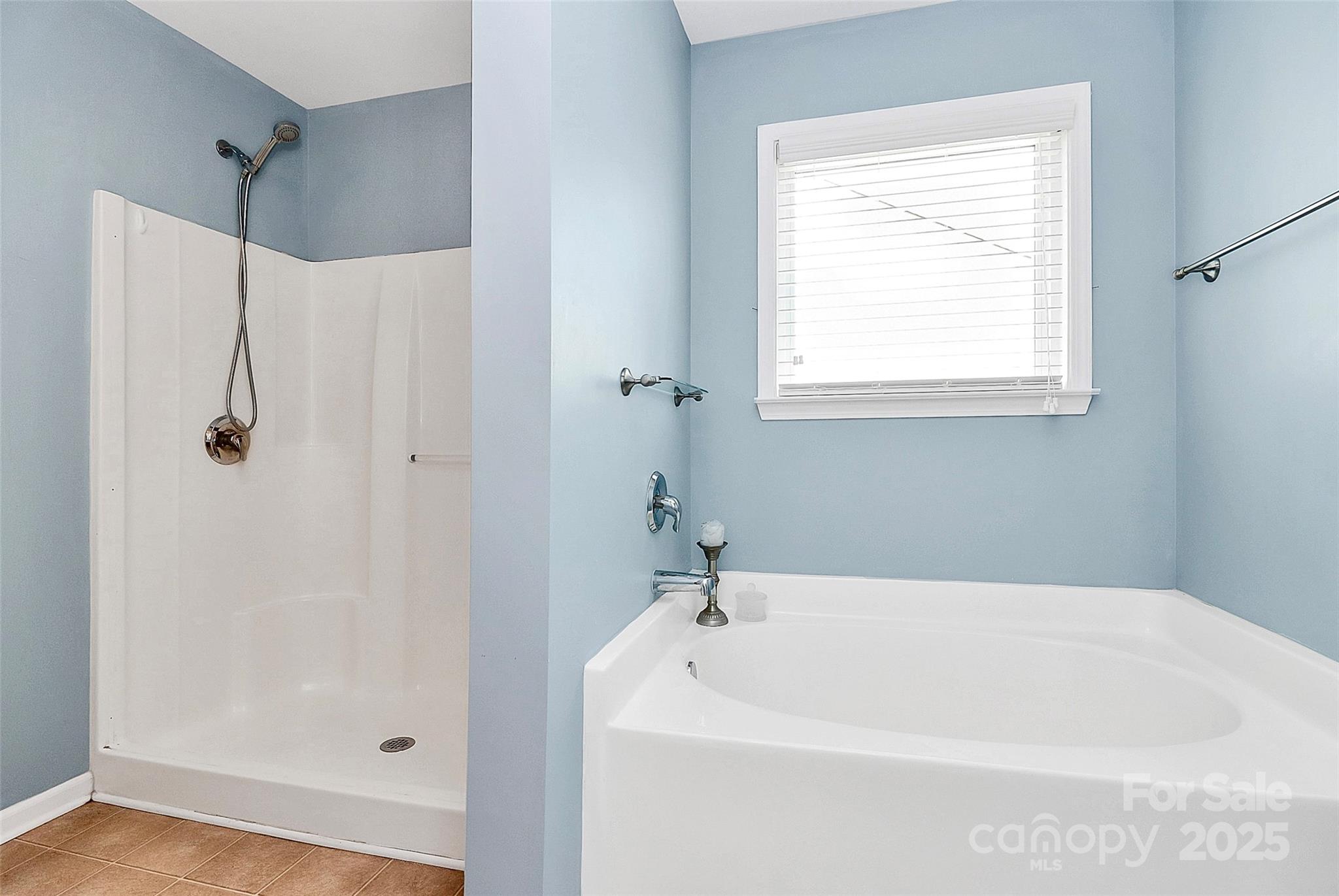 1817 Tradd Avenue Clover, SC 29710 - Photo 36 of 42 a white bath tub sitting next to a window