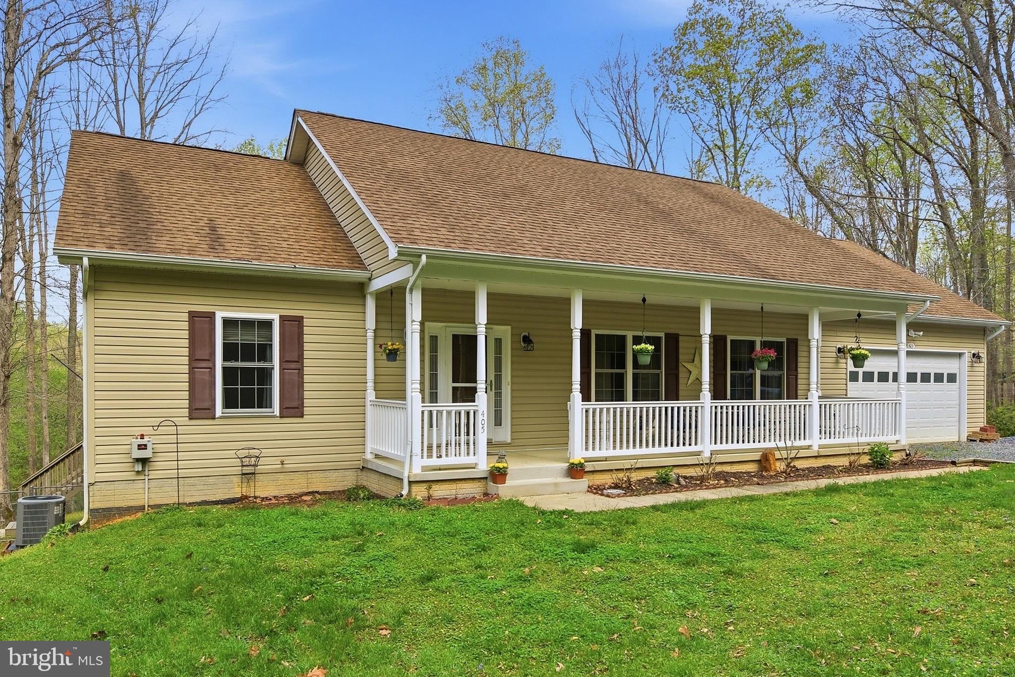 405 Ball Road St. Leonard, MD 20685 - Photo 2 of 40 a view of a house with a garden