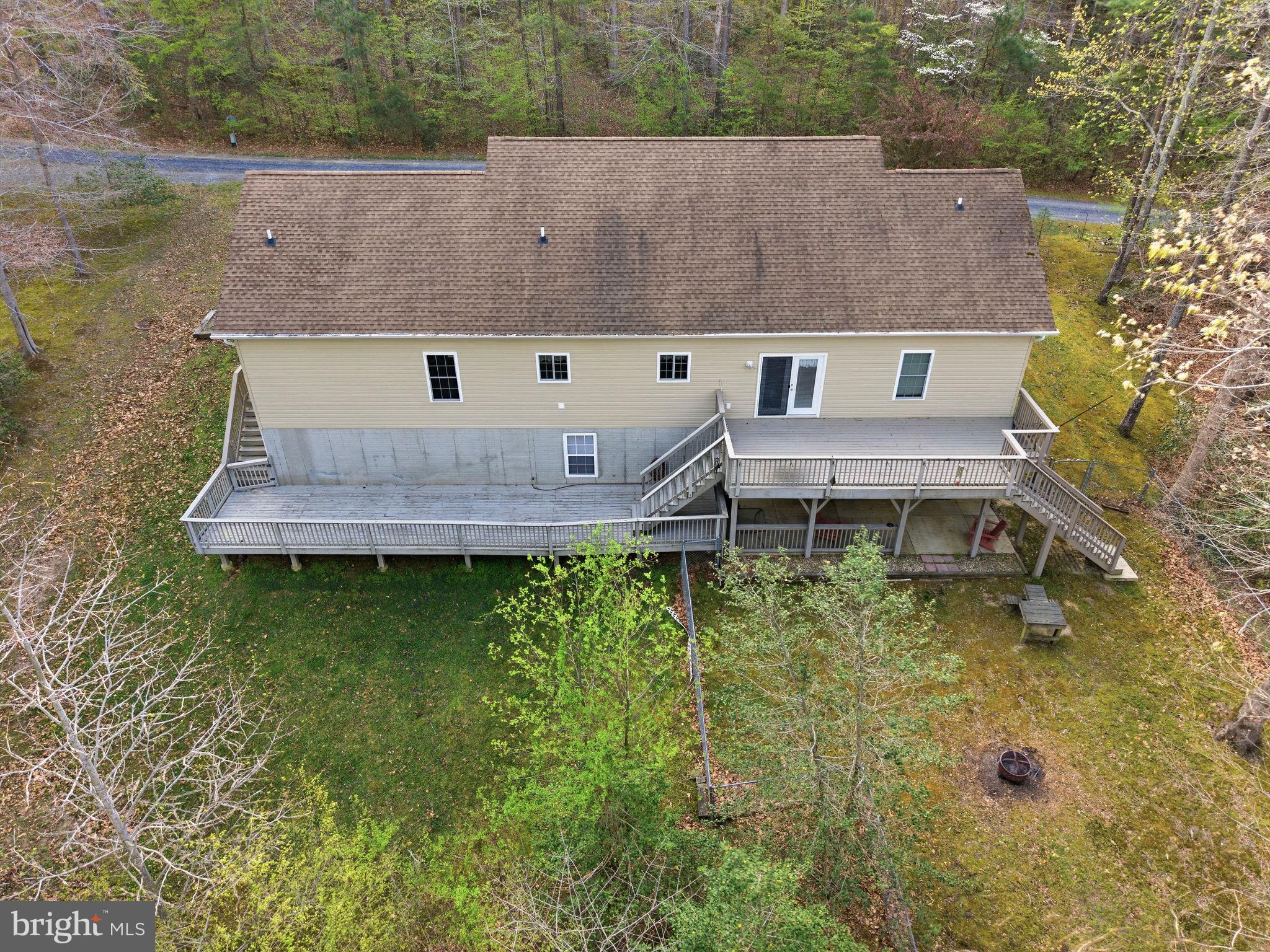 405 Ball Road St. Leonard, MD 20685 - Photo 35 of 40 an aerial view of a house with a garden