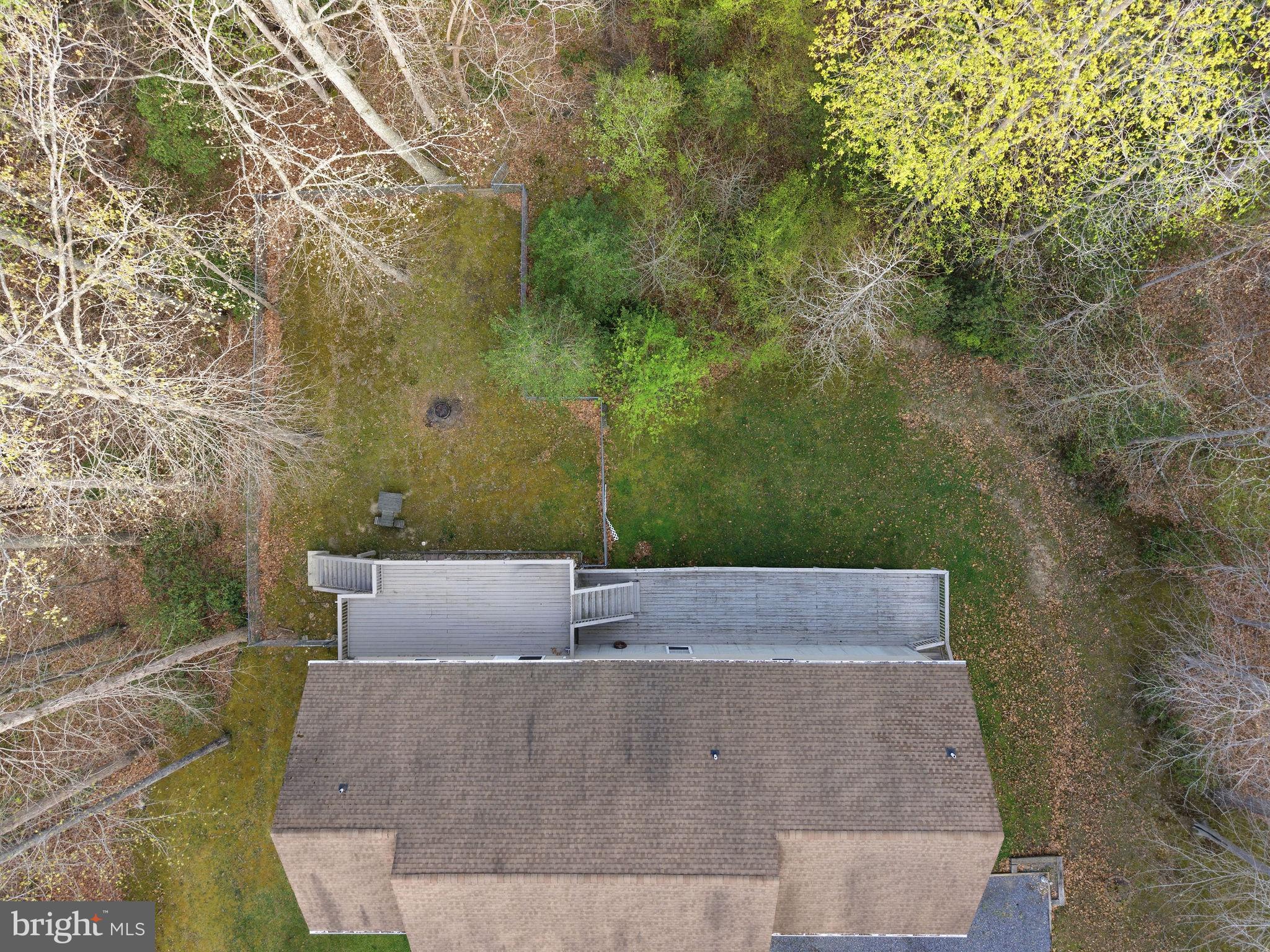 405 Ball Road St. Leonard, MD 20685 - Photo 36 of 40 an aerial view of a house with a yard