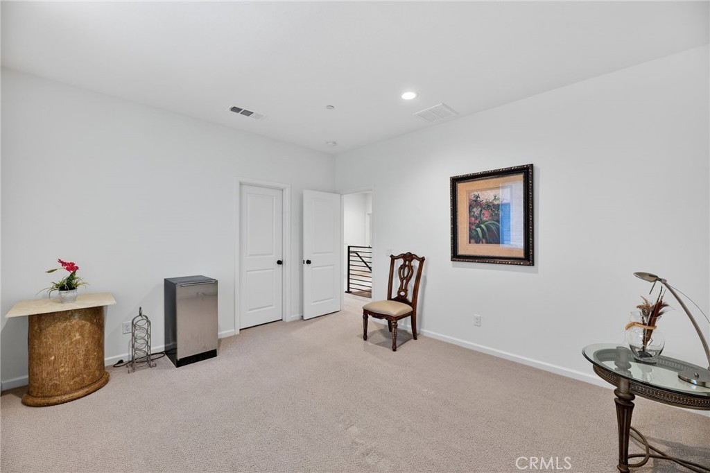 36275 Firelight Circle Wildomar, CA 92595 - Photo 54 of 75 a view of room with workspace and windows