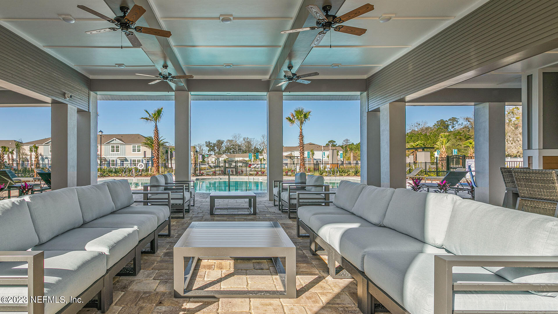 8334 Zenith Circle Jacksonville, FL 32256 - Photo 20 of 33 a living room with furniture and a large window
