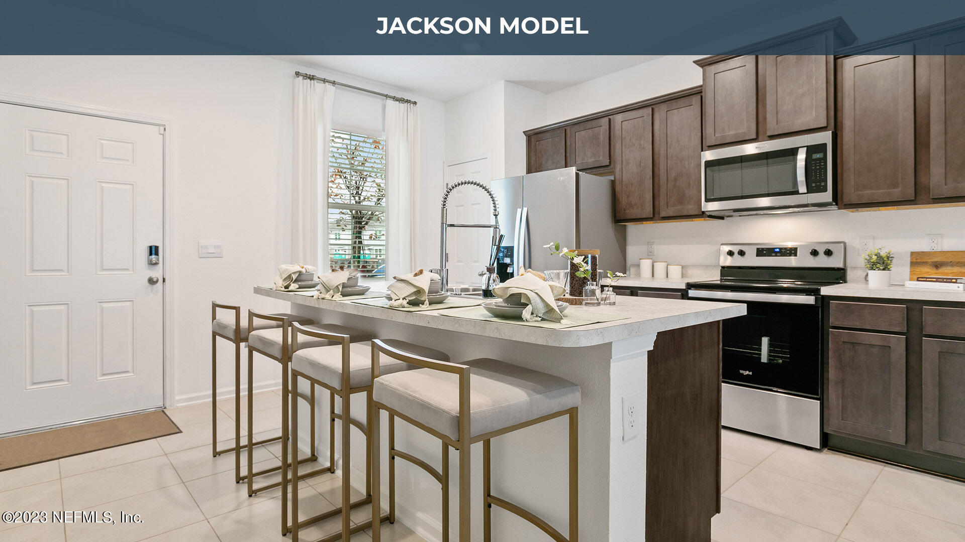 8334 Zenith Circle Jacksonville, FL 32256 - Photo 5 of 33 a kitchen with stainless steel appliances granite countertop a sink a stove and a microwave