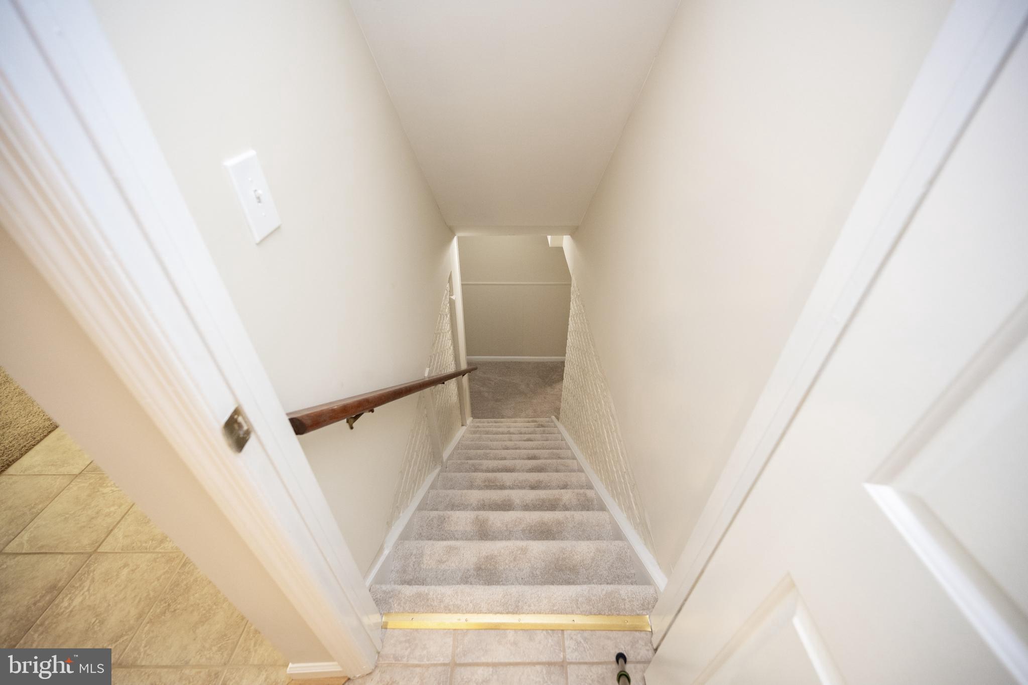4533 Gilbertson Road Fairfax, VA 22032 - Photo 40 of 56 Stairway from main level to basement