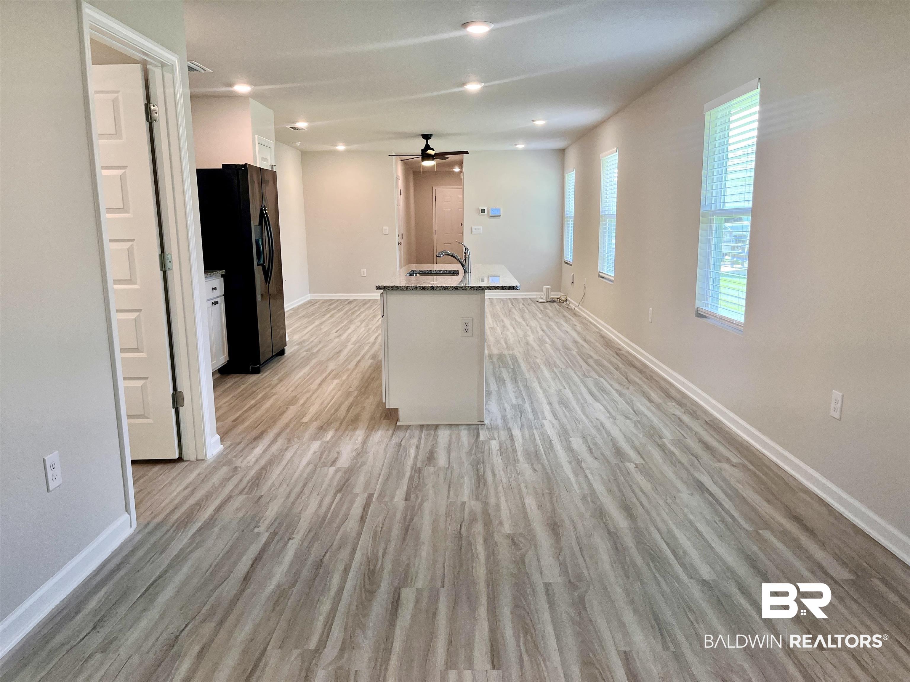8891 Summer Bay Lane Foley, AL 36535 - Photo 21 of 54 Dining area in foreground.