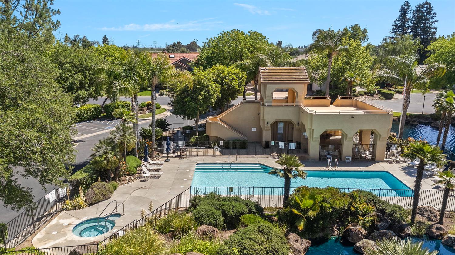 1013 Copper Lake Court Modesto, CA 95355 - Photo 66 of 66 an aerial view of a house with swimming pool garden and patio