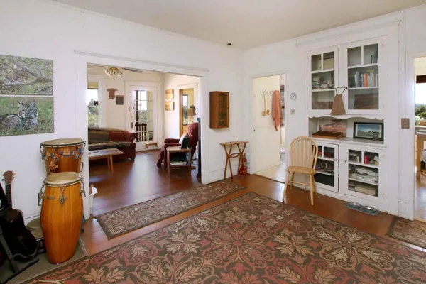 a kitchen that has a sink and a stove