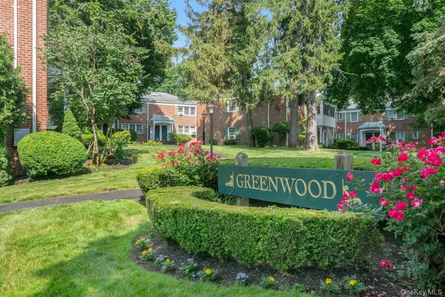 a view of a swimming pool with trees