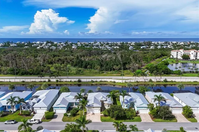 a view of a swimming pool with a table and chairs