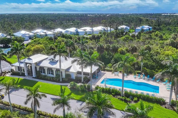a view of a yard with an outdoor seating