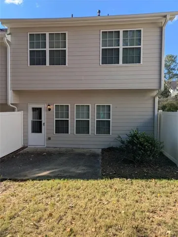 a house view with a outdoor space