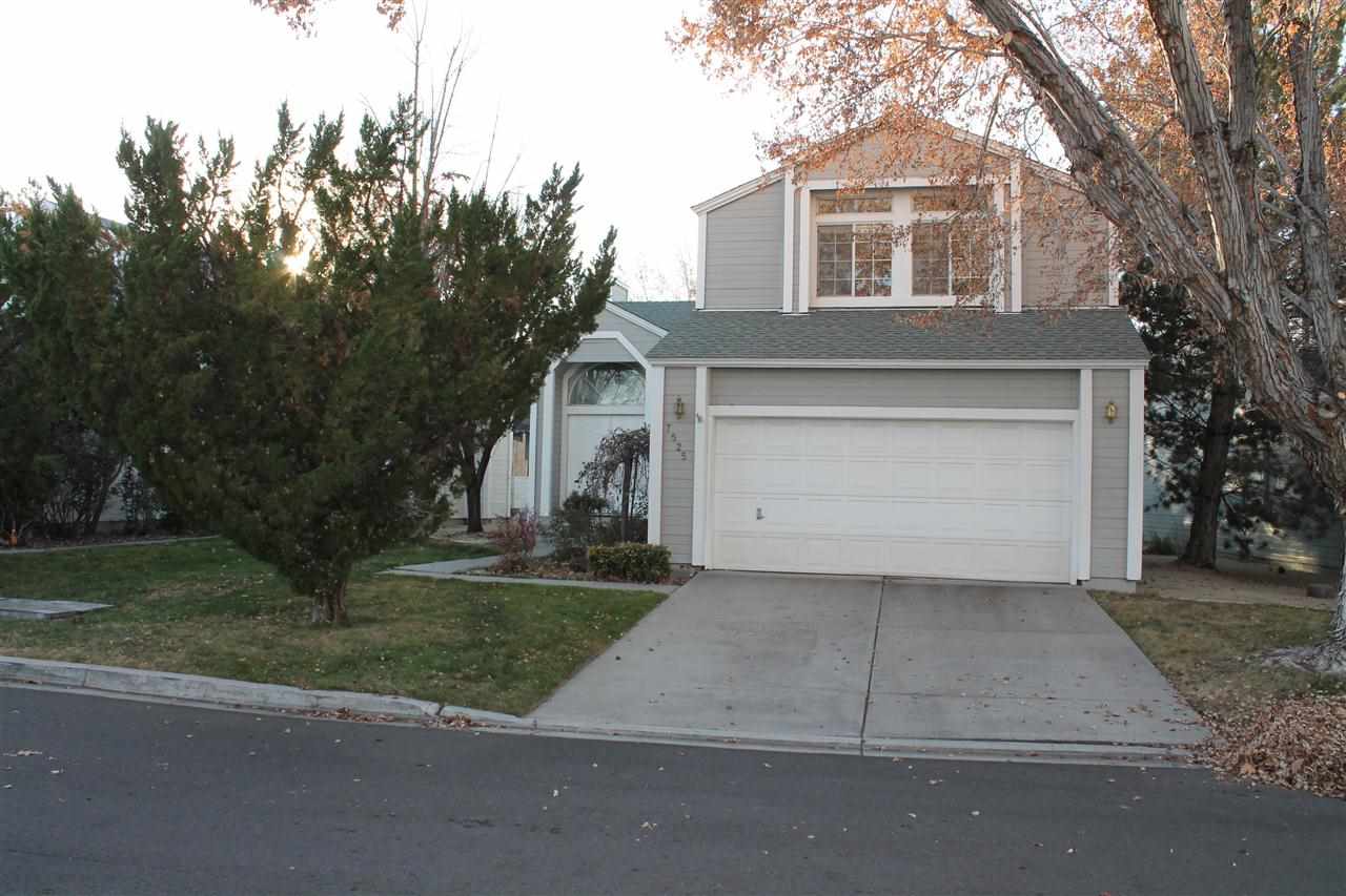 7525 Lighthouse Lane Reno, NV 89511 - Photo 1 of 1 front view of a house with a yard